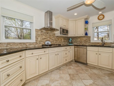 Move right into this beautifully renovated 4-bedroom, 4-bath on Centennial Golf Club of NY - Meadows in New York - for sale on GolfHomes.com, golf home, golf lot
