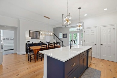 Coastal-chic golf cottage in the private, gated golf community on Berkeley Hall Golf Club in South Carolina - for sale on GolfHomes.com, golf home, golf lot