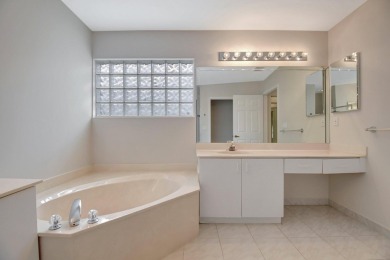 Step into this immaculately maintained 3 bedroom, 2 bath home on Westchester Golf and Country Club in Florida - for sale on GolfHomes.com, golf home, golf lot