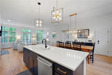 Coastal-chic golf cottage in the private, gated golf community on Berkeley Hall Golf Club in South Carolina - for sale on GolfHomes.com, golf home, golf lot