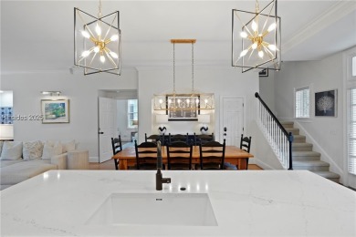 Coastal-chic golf cottage in the private, gated golf community on Berkeley Hall Golf Club in South Carolina - for sale on GolfHomes.com, golf home, golf lot
