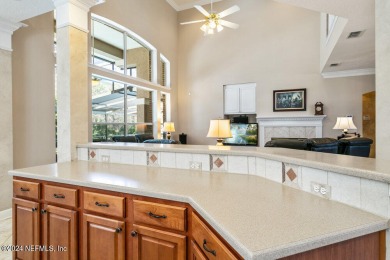 Stunning brick home with pool and screen enclosure situated on a on Julington Creek Golf Club in Florida - for sale on GolfHomes.com, golf home, golf lot