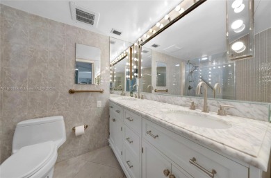 Experience unparalleled luxury in this remodeled Palm Aire on Palm-Aire Country Club and Resort - Palms in Florida - for sale on GolfHomes.com, golf home, golf lot