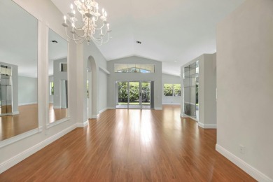 Step into this immaculately maintained 3 bedroom, 2 bath home on Westchester Golf and Country Club in Florida - for sale on GolfHomes.com, golf home, golf lot