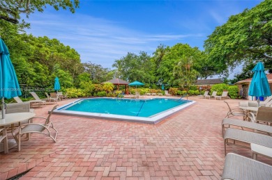 Experience unparalleled luxury in this remodeled Palm Aire on Palm-Aire Country Club and Resort - Palms in Florida - for sale on GolfHomes.com, golf home, golf lot