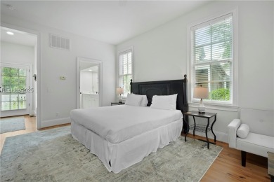 Coastal-chic golf cottage in the private, gated golf community on Berkeley Hall Golf Club in South Carolina - for sale on GolfHomes.com, golf home, golf lot