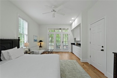 Coastal-chic golf cottage in the private, gated golf community on Berkeley Hall Golf Club in South Carolina - for sale on GolfHomes.com, golf home, golf lot