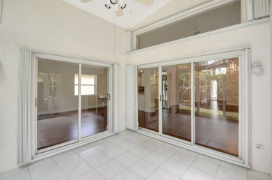 Step into this immaculately maintained 3 bedroom, 2 bath home on Westchester Golf and Country Club in Florida - for sale on GolfHomes.com, golf home, golf lot