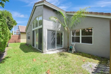 Step into this immaculately maintained 3 bedroom, 2 bath home on Westchester Golf and Country Club in Florida - for sale on GolfHomes.com, golf home, golf lot