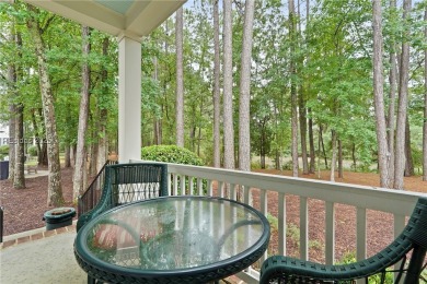Coastal-chic golf cottage in the private, gated golf community on Berkeley Hall Golf Club in South Carolina - for sale on GolfHomes.com, golf home, golf lot
