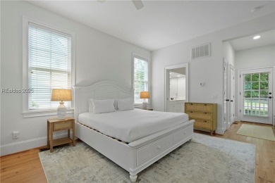 Coastal-chic golf cottage in the private, gated golf community on Berkeley Hall Golf Club in South Carolina - for sale on GolfHomes.com, golf home, golf lot