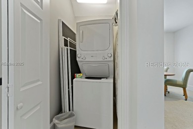 This coastal-chic golf cottage is one of the most requested on Berkeley Hall Golf Club in South Carolina - for sale on GolfHomes.com, golf home, golf lot