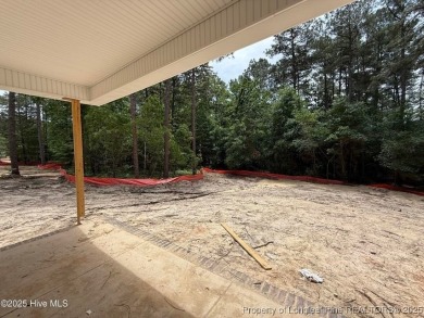 Now available and nearing completion, the 'Emeline' single level on Foxfire Golf and Country Club in North Carolina - for sale on GolfHomes.com, golf home, golf lot
