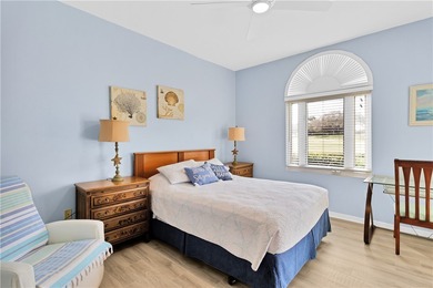 This 2 bedroom, 2 bath Harmony Island condo is Florida living at on Oak Harbor Country Club in Florida - for sale on GolfHomes.com, golf home, golf lot