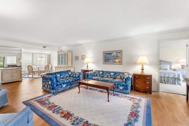 Experience relaxed living in this beautifully appointed on Quail Ridge Golf Course and Country Club in Florida - for sale on GolfHomes.com, golf home, golf lot