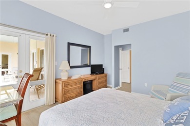 This 2 bedroom, 2 bath Harmony Island condo is Florida living at on Oak Harbor Country Club in Florida - for sale on GolfHomes.com, golf home, golf lot