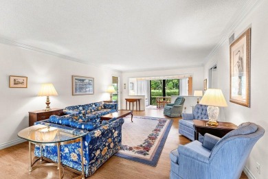 Experience relaxed living in this beautifully appointed on Quail Ridge Golf Course and Country Club in Florida - for sale on GolfHomes.com, golf home, golf lot