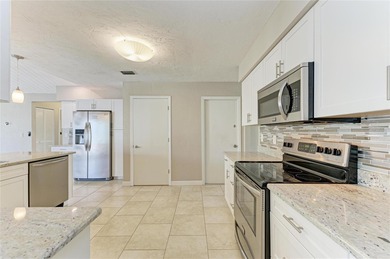 Welcome to this impeccably maintained and beautifully updated on The Meadows Golf and Country Club in Florida - for sale on GolfHomes.com, golf home, golf lot