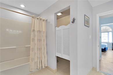 This 2 bedroom, 2 bath Harmony Island condo is Florida living at on Oak Harbor Country Club in Florida - for sale on GolfHomes.com, golf home, golf lot