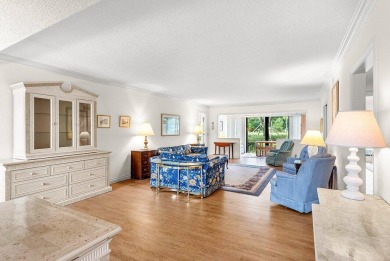 Experience relaxed living in this beautifully appointed on Quail Ridge Golf Course and Country Club in Florida - for sale on GolfHomes.com, golf home, golf lot