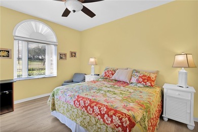 This 2 bedroom, 2 bath Harmony Island condo is Florida living at on Oak Harbor Country Club in Florida - for sale on GolfHomes.com, golf home, golf lot