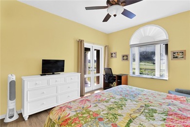 This 2 bedroom, 2 bath Harmony Island condo is Florida living at on Oak Harbor Country Club in Florida - for sale on GolfHomes.com, golf home, golf lot