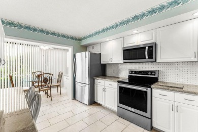 Experience relaxed living in this beautifully appointed on Quail Ridge Golf Course and Country Club in Florida - for sale on GolfHomes.com, golf home, golf lot