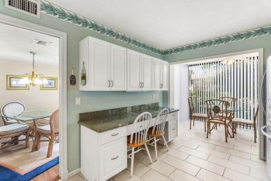 Experience relaxed living in this beautifully appointed on Quail Ridge Golf Course and Country Club in Florida - for sale on GolfHomes.com, golf home, golf lot