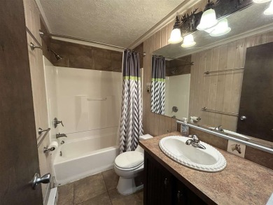 Hello Shanty Creek! Pack your bag, come on up, play and stay on Shanty Creek Golf Course in Michigan - for sale on GolfHomes.com, golf home, golf lot