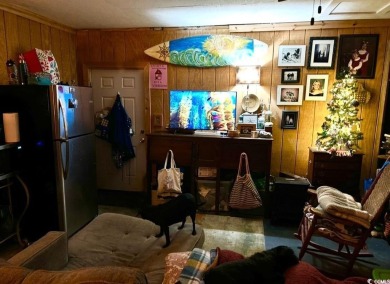 Charming 1960s Beach Cottage - Just 1 Block from the Ocean on Pine Lakes Country Club in South Carolina - for sale on GolfHomes.com, golf home, golf lot