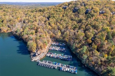 Discover the perfect blend of tranquility and breathtaking views on Big Canoe Golf Club - Cherokee in Georgia - for sale on GolfHomes.com, golf home, golf lot