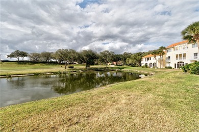 This 2 bedroom, 2 bath Harmony Island condo is Florida living at on Oak Harbor Country Club in Florida - for sale on GolfHomes.com, golf home, golf lot