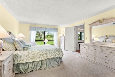 Experience relaxed living in this beautifully appointed on Quail Ridge Golf Course and Country Club in Florida - for sale on GolfHomes.com, golf home, golf lot
