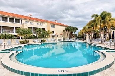 This 2 bedroom, 2 bath Harmony Island condo is Florida living at on Oak Harbor Country Club in Florida - for sale on GolfHomes.com, golf home, golf lot