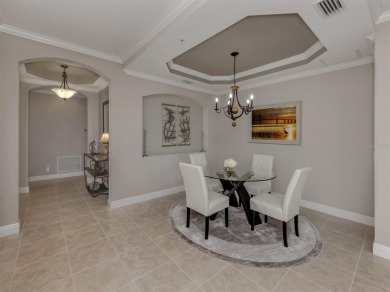 Come live the MAINTENANCE-FREE lifestyle in this beautifully on Venetian Golf and River Club in Florida - for sale on GolfHomes.com, golf home, golf lot