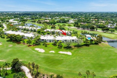 Experience relaxed living in this beautifully appointed on Quail Ridge Golf Course and Country Club in Florida - for sale on GolfHomes.com, golf home, golf lot