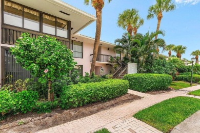 Experience relaxed living in this beautifully appointed on Quail Ridge Golf Course and Country Club in Florida - for sale on GolfHomes.com, golf home, golf lot