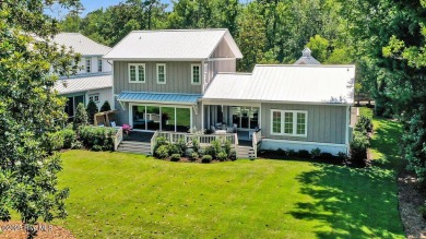 This recently completed Landfall residence perfectly captures on Country Club of Landfall in North Carolina - for sale on GolfHomes.com, golf home, golf lot