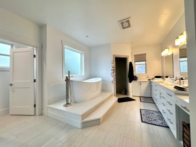 Dream Home Awaits! > Experience luxury living in this stunning on Polson Bay Golf Course - Championship Course in Montana - for sale on GolfHomes.com, golf home, golf lot