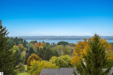 Absolutely stunning 1BR with views of East Bay from main living on  in Michigan - for sale on GolfHomes.com, golf home, golf lot