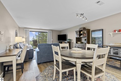 Absolutely stunning 1BR with views of East Bay from main living on  in Michigan - for sale on GolfHomes.com, golf home, golf lot
