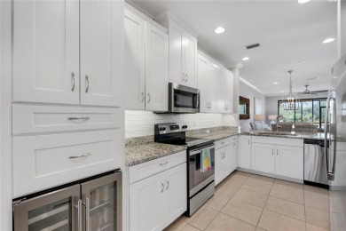 ***PRICE IMPROVEMENT! RARE FIRST-FLOOR GOLF DEEDED END UNIT WITH on Esplanade Golf and Country at Lakewood Ranch in Florida - for sale on GolfHomes.com, golf home, golf lot