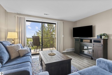 Absolutely stunning 1BR with views of East Bay from main living on  in Michigan - for sale on GolfHomes.com, golf home, golf lot