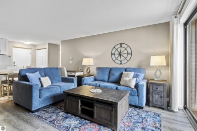 Absolutely stunning 1BR with views of East Bay from main living on  in Michigan - for sale on GolfHomes.com, golf home, golf lot