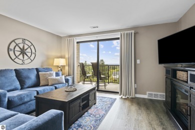 Absolutely stunning 1BR with views of East Bay from main living on  in Michigan - for sale on GolfHomes.com, golf home, golf lot