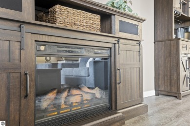 Absolutely stunning 1BR with views of East Bay from main living on  in Michigan - for sale on GolfHomes.com, golf home, golf lot