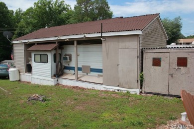 Check out this fully furnished 1994 camper with addition built on River Ridge Golf Club in Virginia - for sale on GolfHomes.com, golf home, golf lot