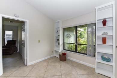 This spacious 3-bedroom, 2-bathroom home with a 2-car garage is on Heritage Ridge Golf Club in Florida - for sale on GolfHomes.com, golf home, golf lot