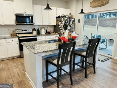 Welcome to this beautiful 4-bedroom, 3-bath Harding floor plan on Chimney Oaks Golf Club in Georgia - for sale on GolfHomes.com, golf home, golf lot