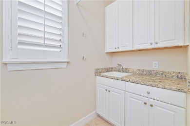 Welcome to your dream home in the prestigious River Hall Country on River Hall Country Club in Florida - for sale on GolfHomes.com, golf home, golf lot